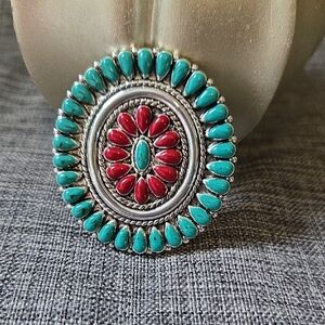 Blue and Red Brooch with Intricate Detailing